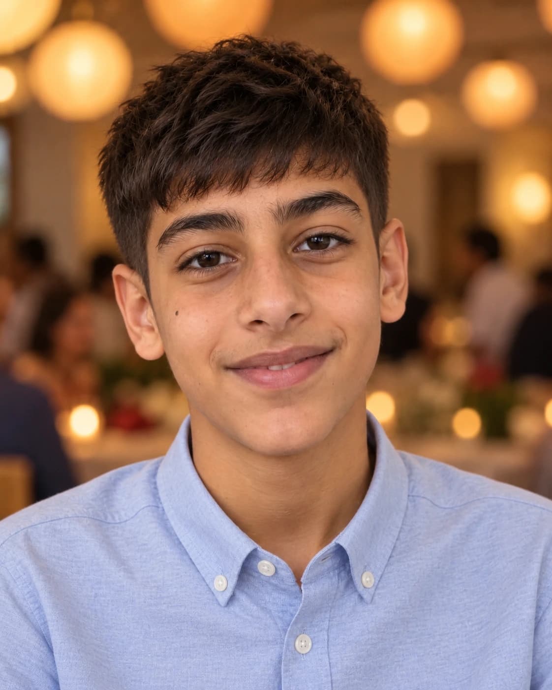 Preteen boy with a short Caesar cut and a straight fringe, front view against warm lantern bokeh